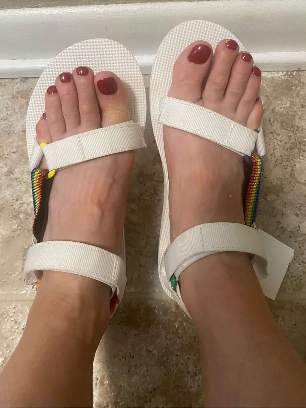 Teva White Sandals with Rainbow Webbing Detail